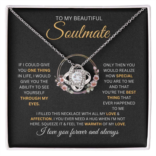 Elegant love knot necklace pendant with cubic zirconia on adjustable chain