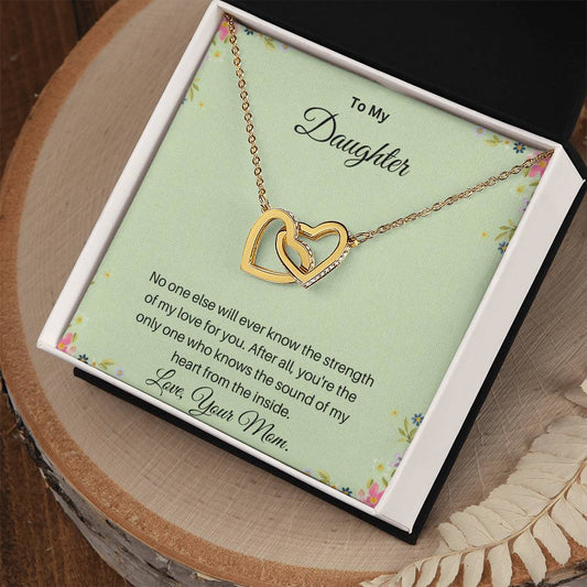 - Interlocking Hearts necklace