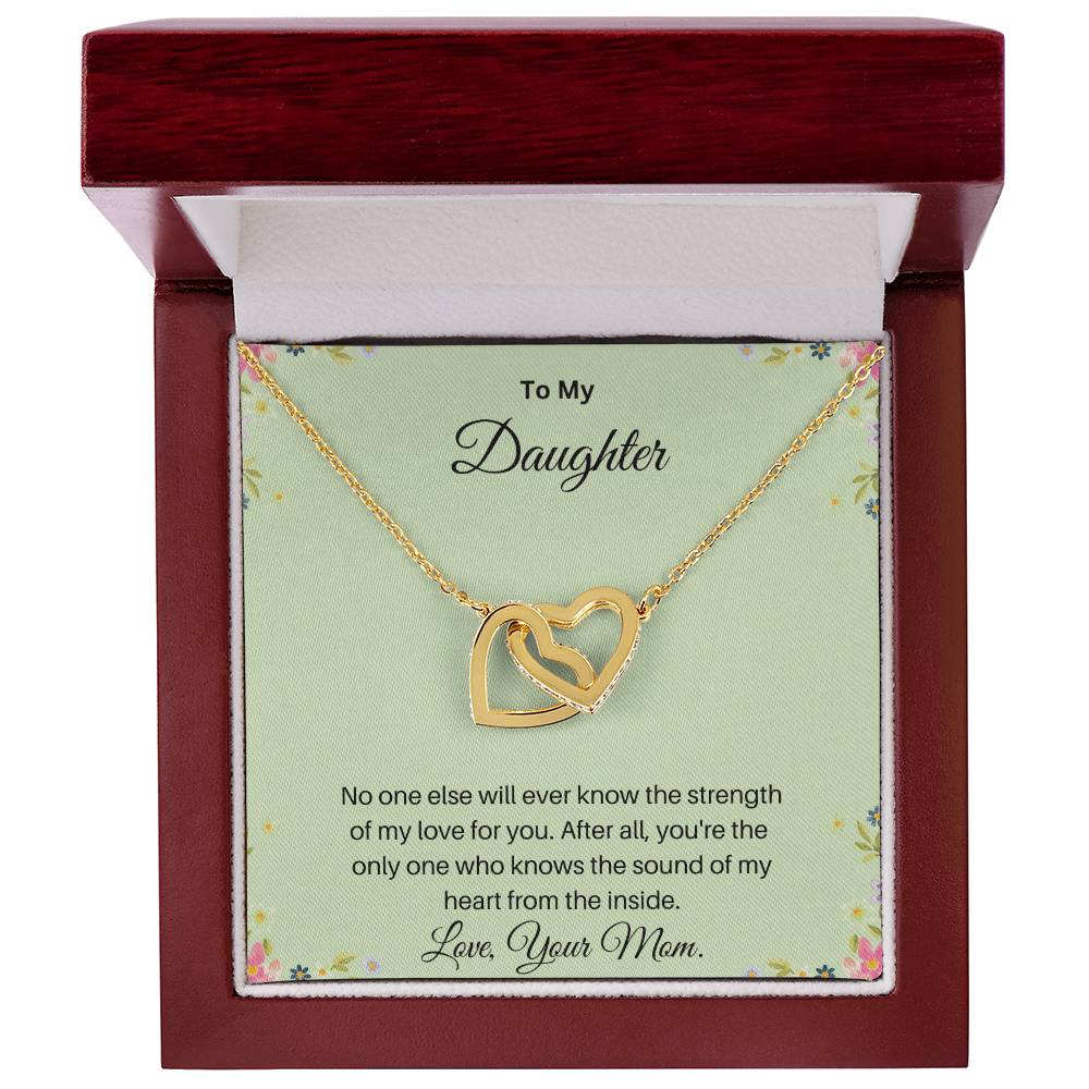 - Interlocking Hearts necklace