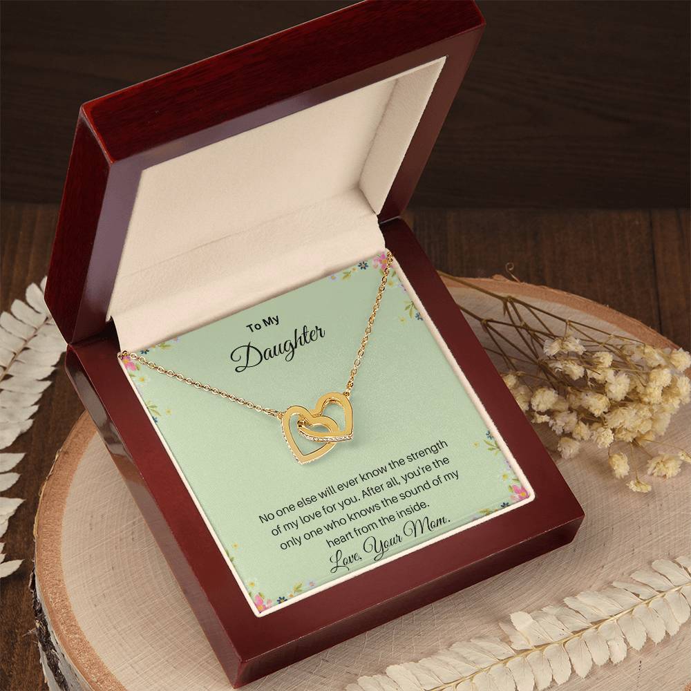 - Interlocking Hearts necklace