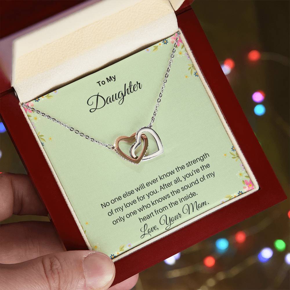 - Interlocking Hearts necklace